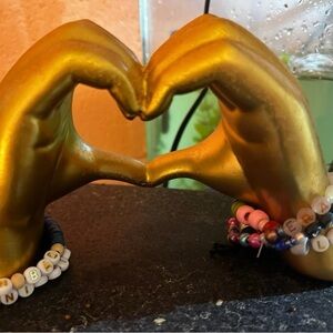 Gold Heart Hands Sculpture